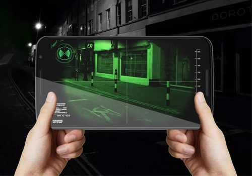 A dark city skyline at night, with the silhouettes of buildings and skyscrapers against a starry sky. In the foreground, a smartphone display showcases the enhanced night vision capabilities of a mobile app, illuminating the scene with a warm, vivid glow. The image conveys the advantages of using night vision apps, highlighting their ability to capture clear, detailed imagery in low-light conditions, making it easier to navigate, explore, and capture the beauty of the urban environment after sunset.